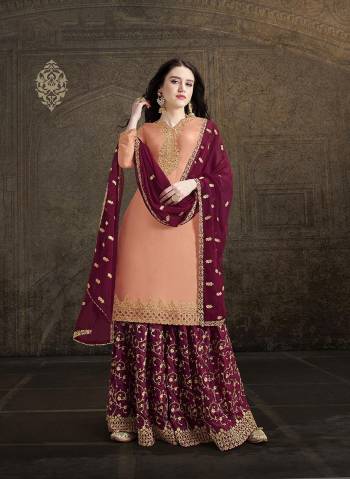 Look Pretty In This Heavy Embroidered Designer Suit In Dark Peach Color Paired With Contrasting Maroon Colored Bottom And Dupatta, Its Top And Bottom Are Satin Based Paired With Georgette Fabricated Dupatta. Buy This Lovely Suit Now. 