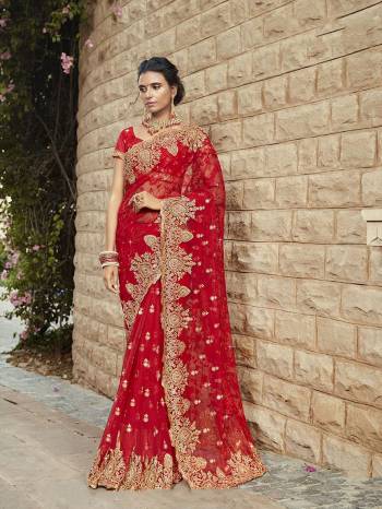 Look Pretty Wearing This Heavy Designer Saree In Red Color Paired With Red Colored Blouse. This Saree Is Net Based Beautified With Heavy Attractive Embroidery Paired With georgette Fabricated Blouse. 
