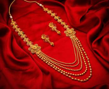 Give An Enhanced Look To Your Personality By Pairing Up This Beautiful Necklace Set With Your Ethnic Attire. This Pretty Set Is In Golden Color Beautified With Stone Work. Buy Now.