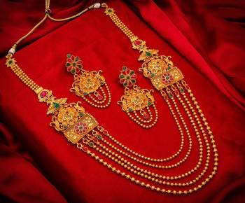 Give An Enhanced Look To Your Personality By Pairing Up This Beautiful Necklace Set With Your Ethnic Attire. This Pretty Set Is In Golden Color Beautified With Stone Work. Buy Now.