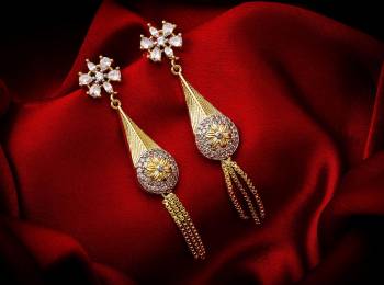 Here Is A Very Pretty Pair Of Simple And Elegant Looking Earring Set In Golden Color. It Has Pretty Unique pattern With Attractive Diamond Work. You can Pair This Even With Simple Attire As Well As A Heavy One. This Pretty Evergreen Design Compliments Any Kind Of Attire You Wear.?