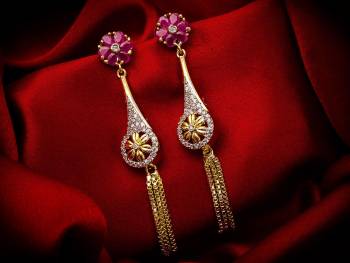 Here Is A Very Pretty Pair Of Simple And Elegant Looking Earring Set In Golden Color. It Has Pretty Unique pattern With Attractive Diamond Work. You can Pair This Even With Simple Attire As Well As A Heavy One. This Pretty Evergreen Design Compliments Any Kind Of Attire You Wear.?