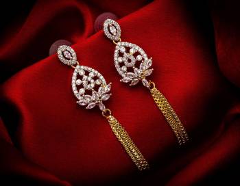 Here Is A Very Pretty Pair Of Delicate And Elegant Looking Earring Set In Golden Color. It Has Pretty Unique pattern With Attractive Diamond Work. You can Pair This Even With Simple Attire As Well As A Heavy One. This Pretty Evergreen Design Compliments Any Kind Of Attire You Wear.?