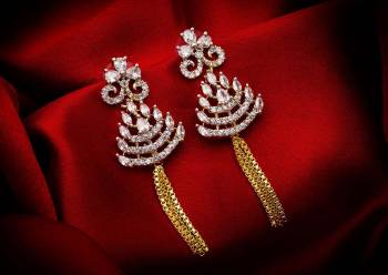 Here Is A Very Pretty Pair Of Delicate And Elegant Looking Earring Set In Golden Color. It Has Pretty Unique pattern With Attractive Diamond Work. You can Pair This Even With Simple Attire As Well As A Heavy One. This Pretty Evergreen Design Compliments Any Kind Of Attire You Wear.?