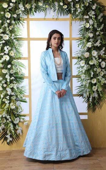 This Wedding Season, Adorn New And Unqiue Look Wearing This Indo-Western Lehenga Choli In White And Sky Blue Color Paired With A Sky Blue Colored Jacket, This Lehenga Choli And Jacket Are Fabricated On Art Silk Which Gives A Rich Look To Your Personality. 