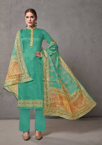 Here Is A Deisgner Straight Suit In Sea Green Kota Checks Pattern. Its Top And Dupatta Are Cotton Silk Based Paired With Cotton Fabricated Bottom. It Is Beautified With Prints Which Makes Easy And Comfortable To Carry All Day Long. 