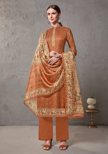 Add This Lovely Kota Checks Suit To Your Wardrobe In Rust Orange Color. This Suit Is Cotton Silk Based Paired With Cotton Bottom And Cotton Silk Dupatta. Buy This Pretty Printed Suit Now.