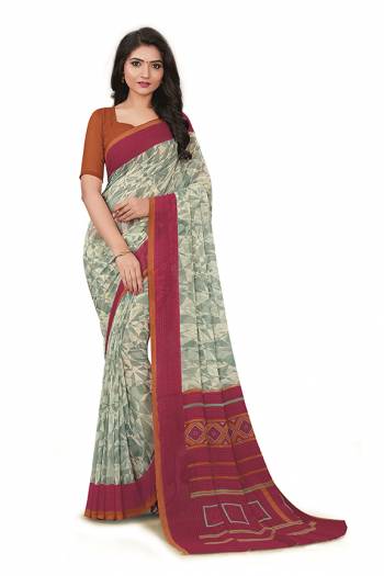No More Worry For What To Wear At Your Place, Grab This Georgette?Fabricated Saree And Blouse Beautified With Prints All Over. This Saree Can Be Used As Uniform At Different Places Like Airports, Hospitals And Hotels?