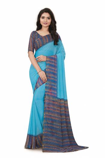 Comfort Is The First Priority When You Go To Your Work Place. So Keeping Your Comfort In Mind This Printed Saree Is Designed As A Uniform For Your Work Place. This Saree And Blouse are Fabricated On Georgette Beautified With Prints Which Is Also Light In Weight And Easy To Carry All Day Long