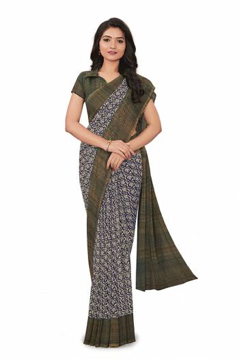 No More Worry For What To Wear At Your Place, Grab This Georgette?Fabricated Saree And Blouse Beautified With Prints All Over. This Saree Can Be Used As Uniform At Different Places Like Airports, Hospitals And Hotels?
