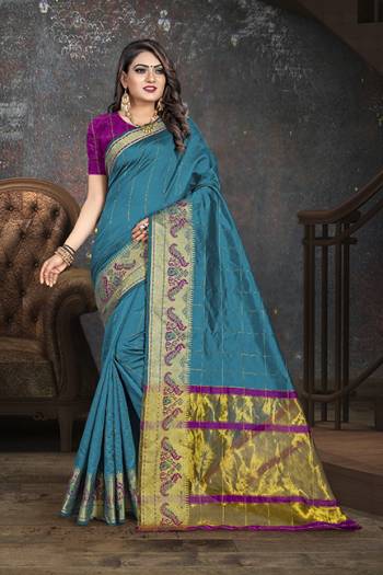 Adorn The Proper Angelic Look Wearing This Lovely Designer Weaved?Saree In Blue Color Paired With Contrasting Purple Colored Blouse. This Saree Is Fabricated On Cotton Paired With Art Silk Fabricated Blouse. Its Rich Fabric Will Give An Enahnced Look To Your Personality.