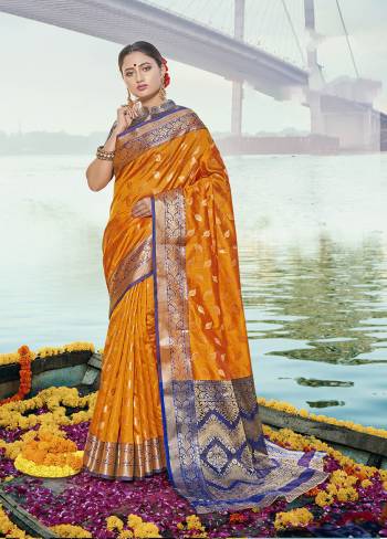 Classy Saree look pretty like never before.Wearing this Orange Color Saree which made from Handloom Silk With Orange Color Handloom Silk blouse, Saree has also decorative work like Heavy Zari Work With Woven.This beautiful Saree features a classy Zari Work