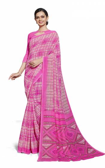 No More Worry For What To Wear At Your Place, Grab This Georgette?Fabricated Saree And Blouse Beautified With Prints All Over. This Saree Can Be Used As Uniform At Different Places Like Airports, Hospitals And Hotels?