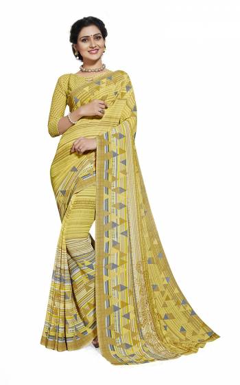 No More Worry For What To Wear At Your Place, Grab This Georgette?Fabricated Saree And Blouse Beautified With Prints All Over. This Saree Can Be Used As Uniform At Different Places Like Airports, Hospitals And Hotels?