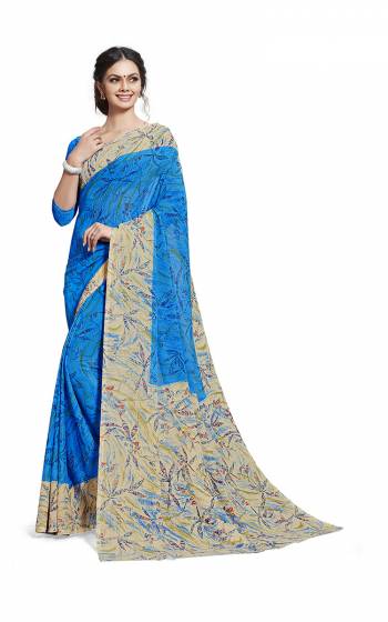 Comfort Is The First Priority When You Go To Your Work Place. So Keeping Your Comfort In Mind This Printed Saree Is Designed As A Uniform For Your Work Place. This Saree And Blouse are Fabricated On Georgette Beautified With Prints Which Is Also Light In Weight And Easy To Carry All Day Long