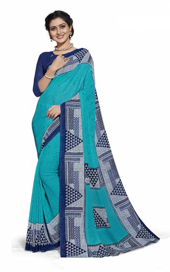 No More Worry For What To Wear At Your Place, Grab This Georgette?Fabricated Saree And Blouse Beautified With Prints All Over. This Saree Can Be Used As Uniform At Different Places Like Airports, Hospitals And Hotels?