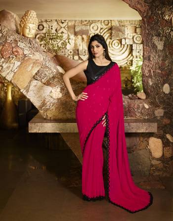 Shine Bright In This Attractive Looking Dark Pink Colored Saree Paired With Black Colored Blouse. This Pretty Saree Is Fabricated on Georgette Paired With Art Silk Fabricated Blouse. 