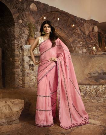 Look Pretty In This Very Beautiful Designer Saree In Pink Color Paired With Off-White Colored Blouse. This Saree Is Fabricated On Slub Silk Paired With Art Silk Fabricated Blouse. It Is Light In Weight And Easy To Carry All Day Long. 
