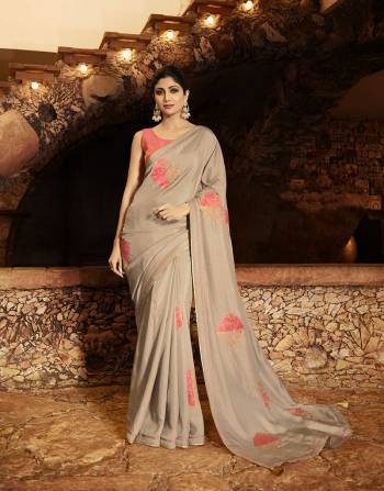 Here Is A Very Beautiful Designer Saree In Dusty Grey Color Paired With Contrasting Pink Colored Blouse. This Saree Is Fabricated On Soft Silk Paired With Art Silk Fabricated Blouse. Its Unique Color Pallete And Pattern Will Earn You Lots Of Compliments From Onlookers. 
