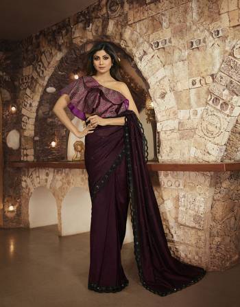 For A Royal Look, Grab This Rich And Elegant Looking Designer Saree In Dark Wine Color Paired With Contrasting Purple Colored Blouse. This Saree Is Fabricated on Soft Silk Paired With Art Silk Fabricated Blouse. Buy This Lovely Saree Now.