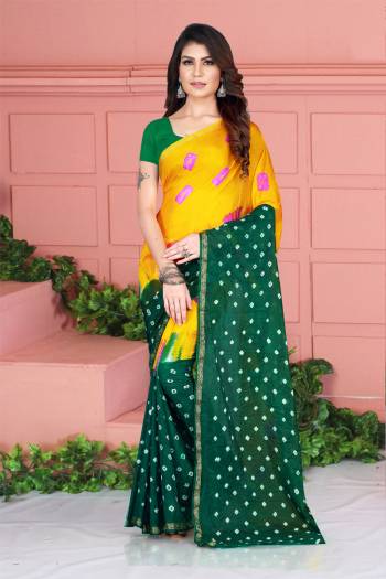 Grab This Pretty Designer Bandhani Saree In Yellow And Green Color. This Saree And Blouse Are Fabricated On Tafeta Art Silk Beautified With Prints. It Is Light In Weight And Easy To Carry All Day Long. 