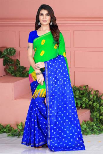 Grab This Pretty Designer Bandhani Saree In Parrot Green And Royal Blue Color. This Saree And Blouse Are Fabricated On Tafeta Art Silk Beautified With Prints. It Is Light In Weight And Easy To Carry All Day Long. 