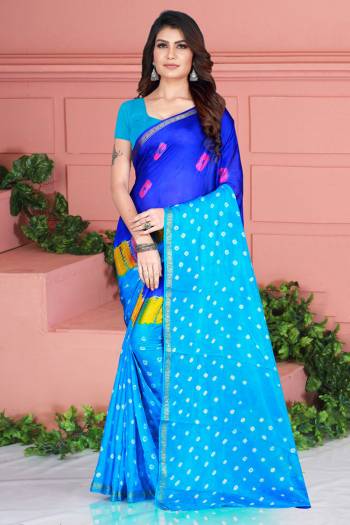 Grab This Pretty Designer Bandhani Saree In Royal Blue And Blue Color. This Saree And Blouse Are Fabricated On Tafeta Art Silk Beautified With Prints. It Is Light In Weight And Easy To Carry All Day Long. 