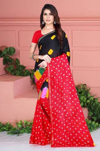 Grab This Pretty Designer Bandhani Saree In Black And Red Color. This Saree And Blouse Are Fabricated On Tafeta Art Silk Beautified With Prints. It Is Light In Weight And Easy To Carry All Day Long. 
