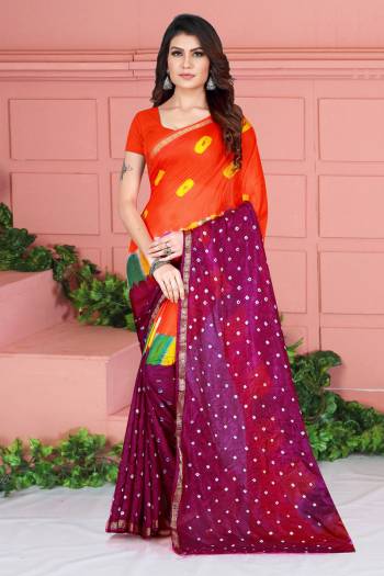 Grab This Pretty Designer Bandhani Saree In Orange And Magenta Pink Color. This Saree And Blouse Are Fabricated On Tafeta Art Silk Beautified With Prints. It Is Light In Weight And Easy To Carry All Day Long. 