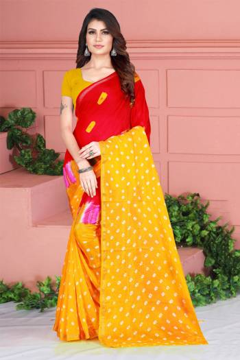 Grab This Pretty Designer Bandhani Saree In Red And Yellow Color. This Saree And Blouse Are Fabricated On Tafeta Art Silk Beautified With Prints. It Is Light In Weight And Easy To Carry All Day Long. 