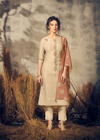 Flaunt Your Rich And Elegant Taste Wearing This Designer Readymade Suit In Beige Color Paired With Light Brown Colored Foil Printed Viscose Dupatta. Also This Suit Is Viscose Based Beautified With Hand Work. 