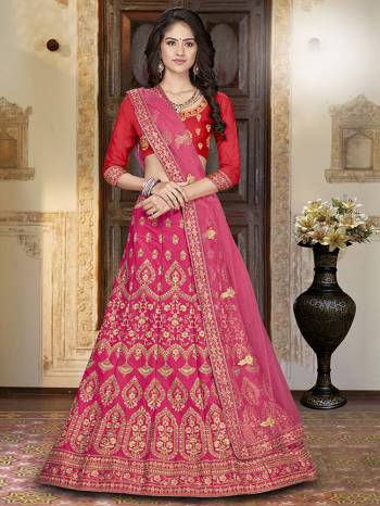 For A Proper Traditional Look, Grab This Heavy Designer Lehenga Choli In Red Colored Blouse Paired With Pink Colored Lehenga And Dupatta. Its Blouse Is Fabricated On Art Silk Paired With Satin Silk Lehenga And Net Fabricated Dupatta. It Is Beautified With Attractive Embroidery. Buy This Pretty Piece Now.