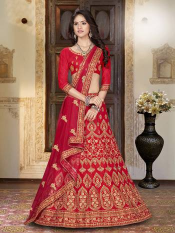 For A Proper Traditional Look, Grab This Heavy Designer Lehenga Choli In Red Color. Its Blouse Is Fabricated On Art Silk Paired With Satin Silk Lehenga And Net Fabricated Dupatta. It Is Beautified With Attractive Embroidery. Buy This Pretty Piece Now.