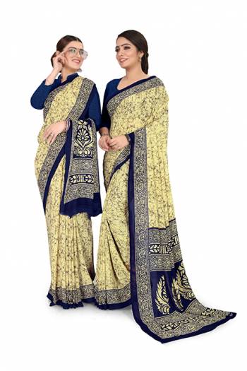 Comfort Is The First Priority When You Go To Your Work Place. So?Keeping Your Comfort In Mind This Printed Saree Is Designed As A Uniform For Your Work Place. This Saree And Blouse are Fabricated On Georgette Beautified With Prints Which Is Also Light In Weight And Easy To Carry All Day Long