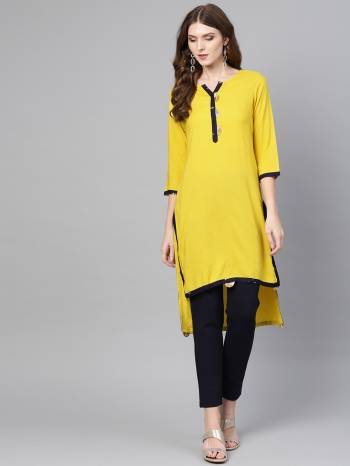 Simple And Elegant Looking Plain Kurti Is Here In Yellow Color Fabricated On Rayon. You can Pair This Up With Same Or Contrasting Colored Bottom. Buy Now.