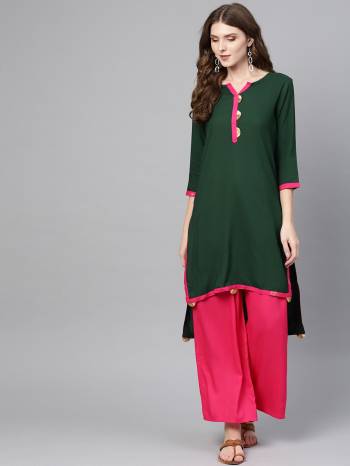 Simple And Elegant Looking Plain Kurti Is Here In Dark Green Color Fabricated On Rayon. You can Pair This Up With Same Or Contrasting Colored Bottom. Buy Now.