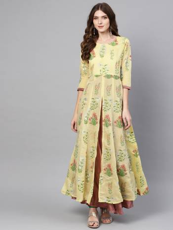 For Your Semi-Casual Wear, Grab This Readymade Long Kurti In Yellow Color Fabricated On Chanderi Silk. It Is Beautified With Floral Prints. Buy Now.