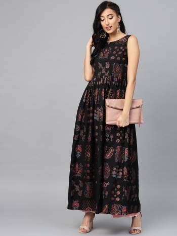 For A Bold And Beautiful Look, Grab This Readymade Long Kurti In Black Color Fabricated On Crepe. This kurti Is Beautified With Prints All Over. 