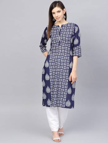 Rich Looking Readymade Printed Kurti Is Here In Navy Blue Color. This Pretty Kurti Is Fabricated on Muslin Beautified With Prints. Buy Now.