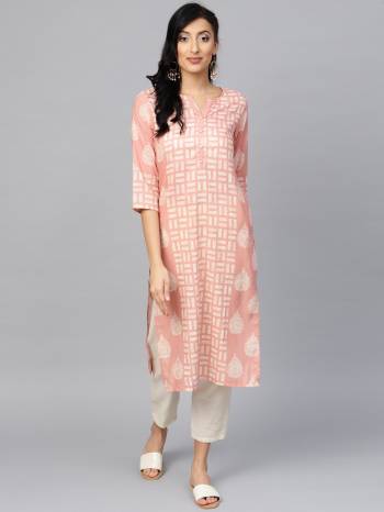 Rich Looking Readymade Printed Kurti Is Here In Light Peach Color. This Pretty Kurti Is Fabricated on Muslin Beautified With Prints. Buy Now.