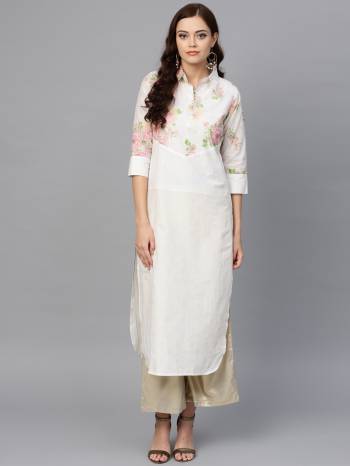 Grab This Simple Kurti For Your Casual Wear In White Color. This Printed Kurti Is Fabricated on Cotton Beautified With Prints. 