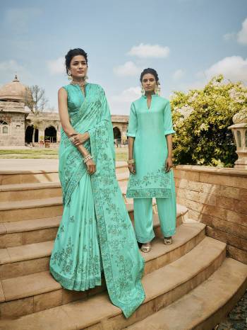 Celebrate This Festive And Wedding Season Wearing This Heavy Designer Saree In Sea Green Color Paired With Sea Green Colored Blouse. This Pretty Tone To Tone Embroidered Saree Is Fabricated On Satin Paired With Art Silk Fabricated Blouse. 