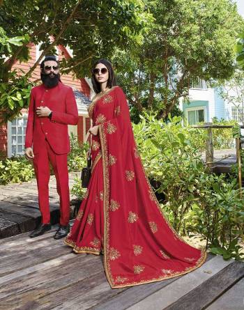 Catch All The Limelight At The Next Function You Attend Wearing This Lovely Designer Saree In Red Color Paired With Copper Colored Blouse. This Pretty Embroidered Saree Is Fabricated On Art Silk Paired With Jacquard Silk Fabricated Blouse. 