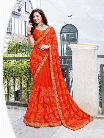 Shine Bright Wearing This Attractive Looking Heavy Designer Saree In Orange Color Paired With Orange Colored Blouse. This Saree Is Fabricated on Georgette Beautified With Embroidery Paired With Art Silk Fabricated Blouse. Buy This Designer Saree Now.