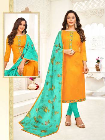 Celebrate This Festive Season Wearing This Designer Straight Suit In Musturd Yellow Color Paired With Contrasting Sea Green Colored Bottom And Dupatta. Its Top Is Fabricated On Art Silk Paired With Cotton Bottom And Chanderi Fabricated Dupatta. 