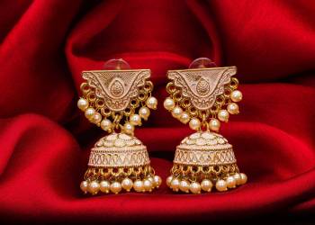 Grab The New Trendy Jhumkas To Pair Up With Your Traditional Attire. You Can Pair This Up Same Or Contrasting Colored Attire. Also These Lovely Jhumka Earrings Will Definitely Earn You Lots Of Compliments From Onlookers. 