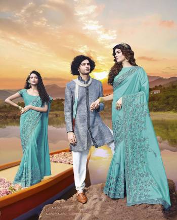 Add This Beautiful Heavy Designer Saree To Your Wardrobe In Turquoise Blue Color Paired With Turquoise Blue Colored Blouse. This Saree And Blouse Are Fabricated On Art Silk Beautified With Heavy Embroidery. 