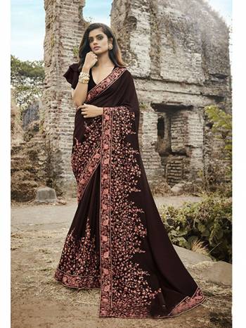 New Shade Is Here To Add Into Your Wardrobe With This Heavy Designer Saree In Dark Brown Color Paired With Dark Brown Colored Blouse. This Saree Is Fabricated On Soft Silk Paired With Art Silk Fabricated Blouse. 