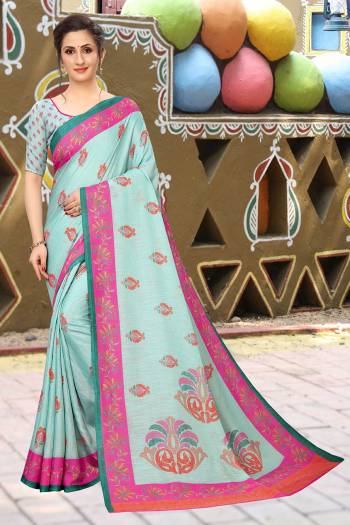 For Your Semi-Casual Wear, Grab This Lovely Printed Saree In Aqua Blue Color. This Saree And Blouse Are Fabricated On Soft Cotton Which Is Light Weight, Soft Towards Skin And Easy To Carry All Day Long. 