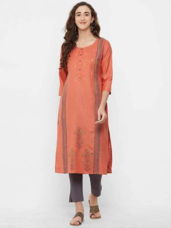 Beat The Heat This Summer Wearing This Pretty Light Weight Readymade Kurti In Rust Orange Color Fabricated On Cotton Slub. You Can Pair This Up With Same Or Contrasting Colored bottom. 